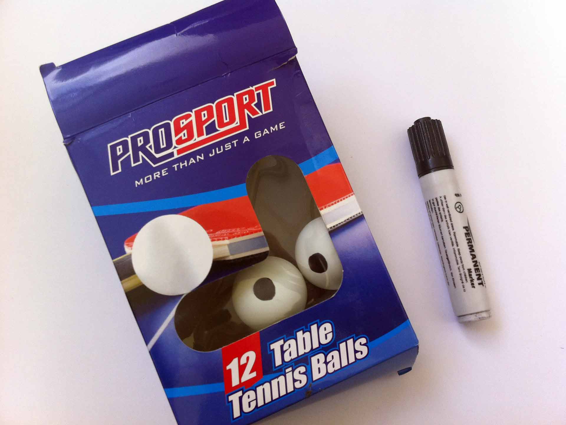 public-eye-urban-intervention-eyes-table-tennis-ball-packaging-on-white-background