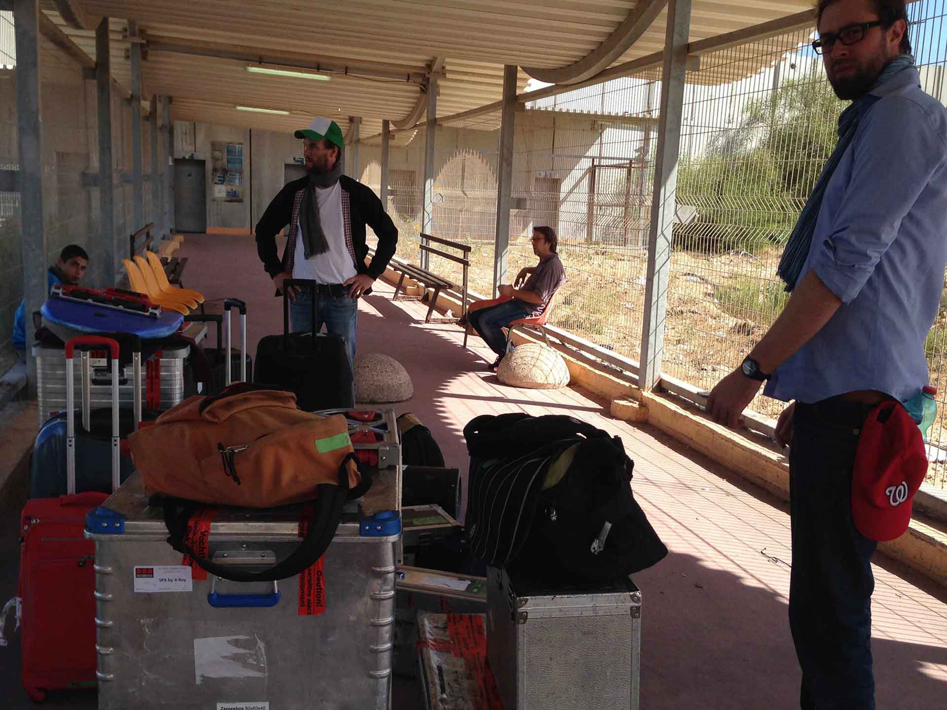 gaza-surf-club-crew-with-equipment-taking-shade