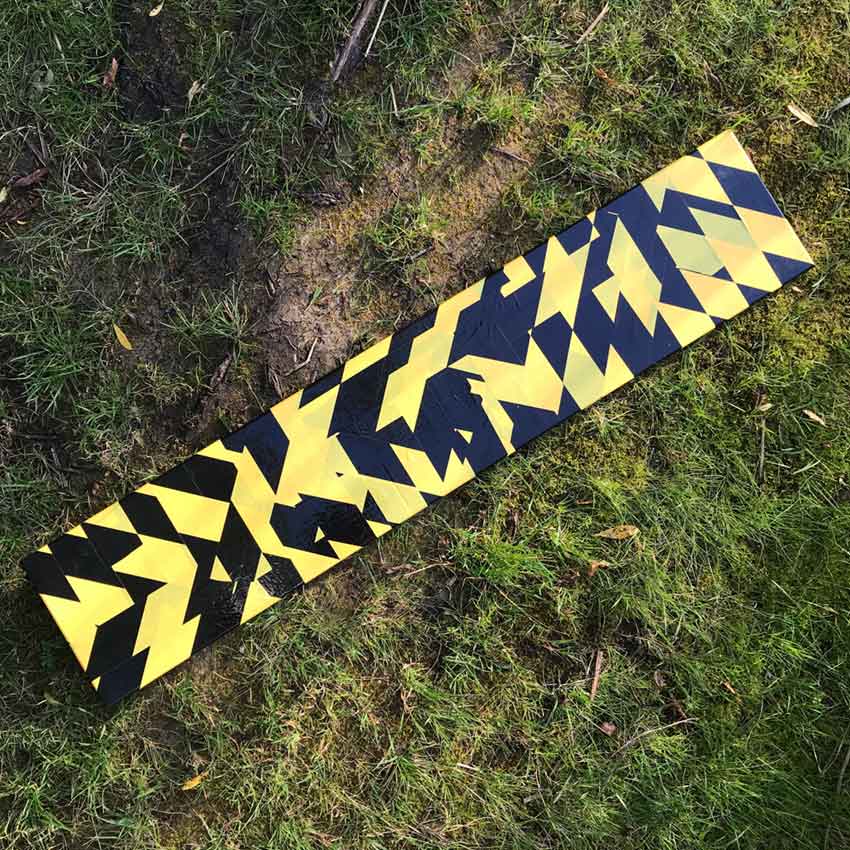 canvas covered in hazard tape